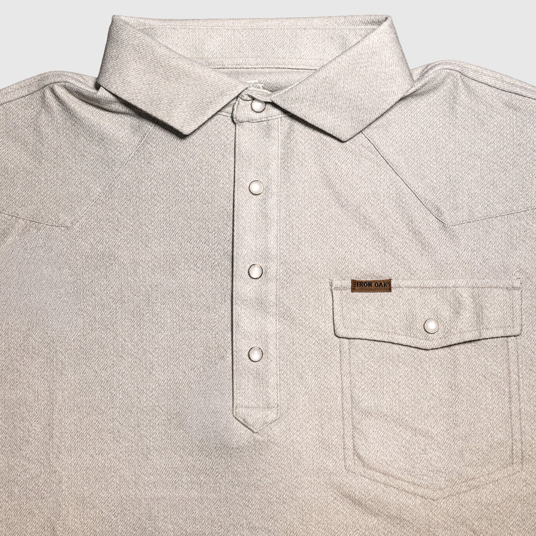 The Otis pearl-snap polo by Iron Oak