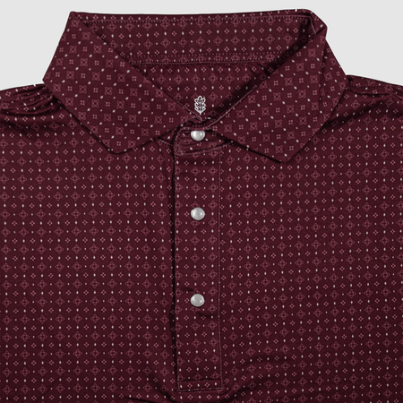 Flat lay of The Bennett Pearl Snap Polo by Iron Oak Apparel, featuring a detailed western pattern in rich maroon, complete with signature pearl snap buttons. This stylish shirt blends modern design with Texan authenticity, perfect for any casual or dressy occasion.