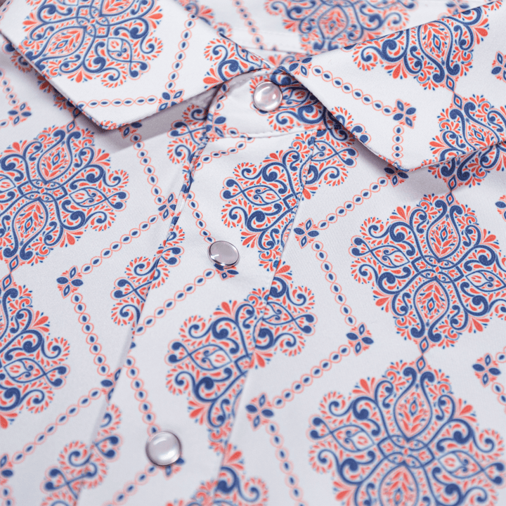 Detailed view of the pearl snap buttons and intricate pattern on The Hold 'Em Pearl Snap Polo by Iron Oak Apparel.